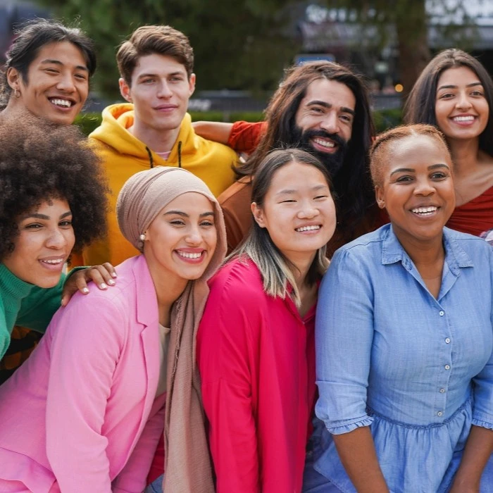 Crowd of multiracial people enjoying the day together and advocating for the San Diego Regional Alliance for Fair Housing